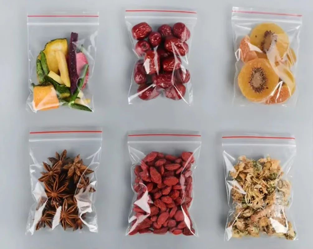 50micron 100 개/갑/팩 높은 투명 PE 지퍼 잠금 가방 재밀봉 가능한 플라스틱 설탕 캔디 말린 과일 분말 책 선물 쿠키 파우치