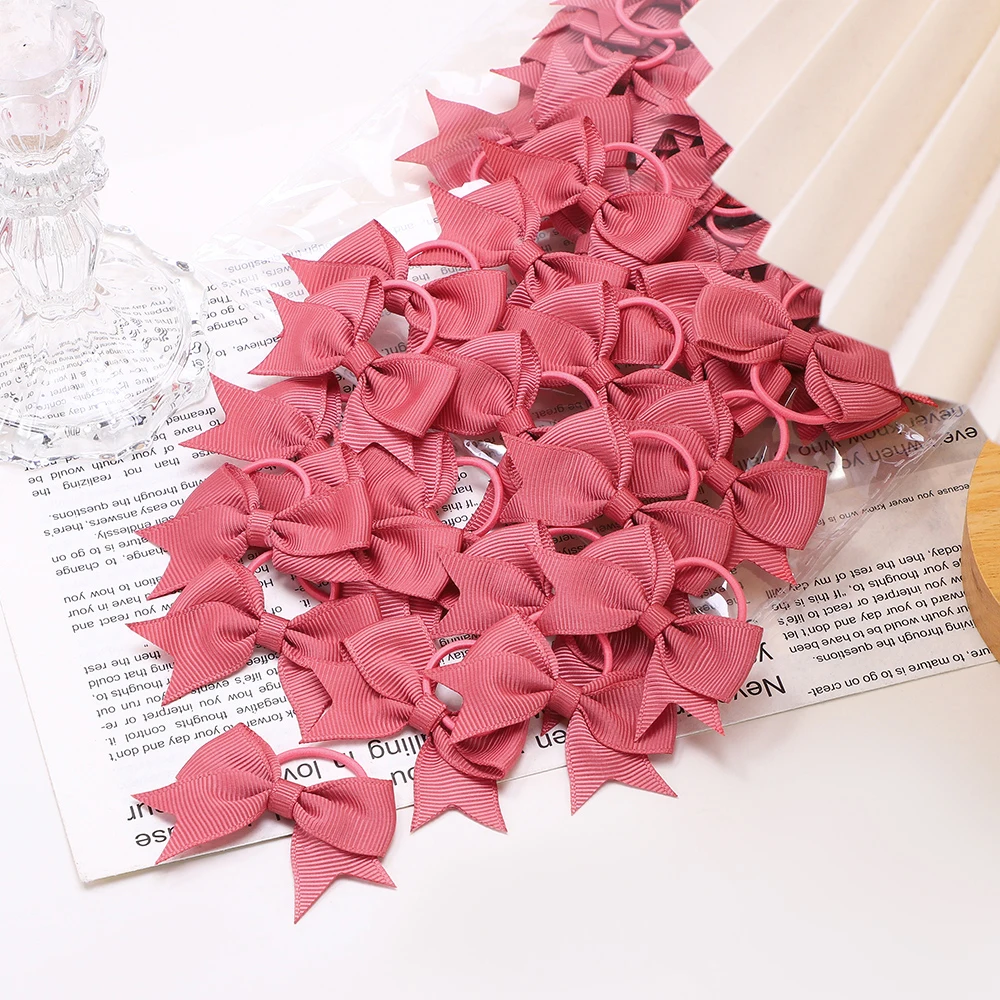 아기 활 10Pcs 새로운 색상 Grosgrain 리본 활 탄성 Hairties 헤어 밴드 여자 봄 머리 밧줄 헤어 액세서리 도매